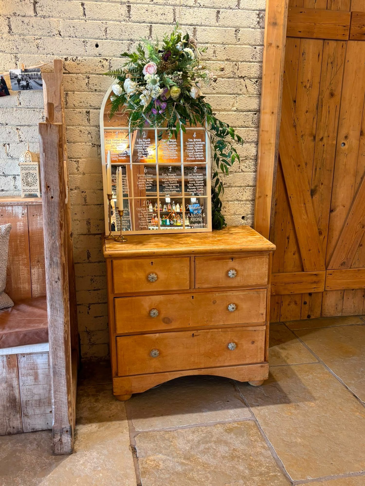 Vintage window frame table plan topped with a floral swag